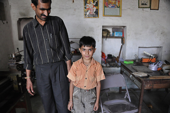 Nayran and his son in his Bell Metal Workshop Ranapur