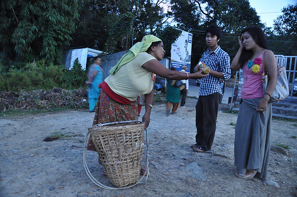 Nepali Woman selling Mangos
