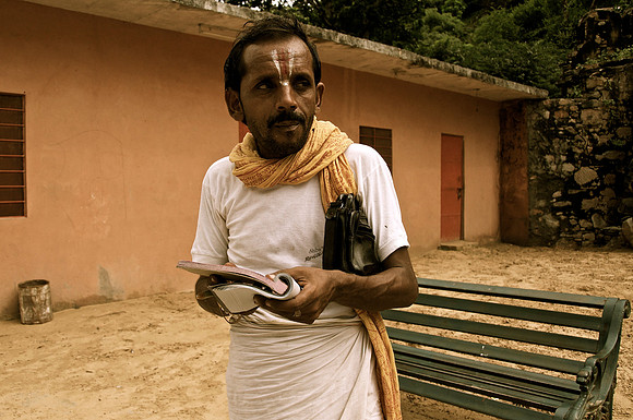 Pandit at Monkey Temple Collecting Money for Photographing