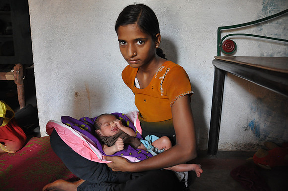 Young Woman with Baby Sister Khajaraho