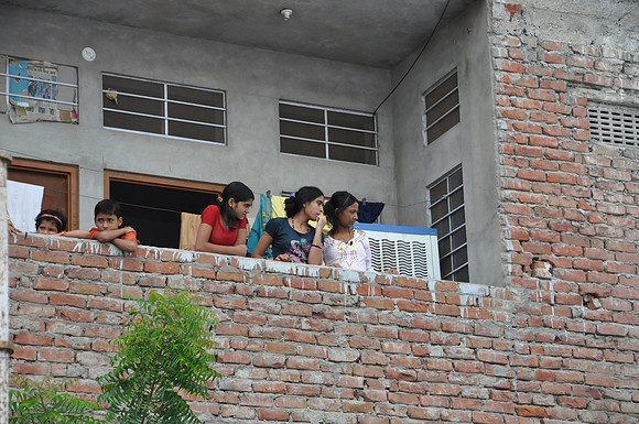 Children Watching Warren Academy Celebrations from Balcony